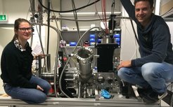 Figure 2: Drs. Victoria Walpole (left) and Kai Golibrzuch (right) with their new HBEAM apparatus. They plan to produce H atom pulses as short as 100 ps.
