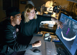 Dr. Melina Schuh and Dr. Binyam Mogessie in the microscopy lab of the Department of Meiosis.